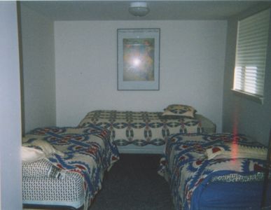 bedroom with 3 beds